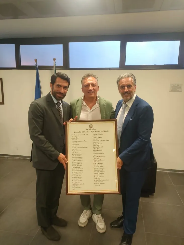 Plaque handover during an institutional meeting